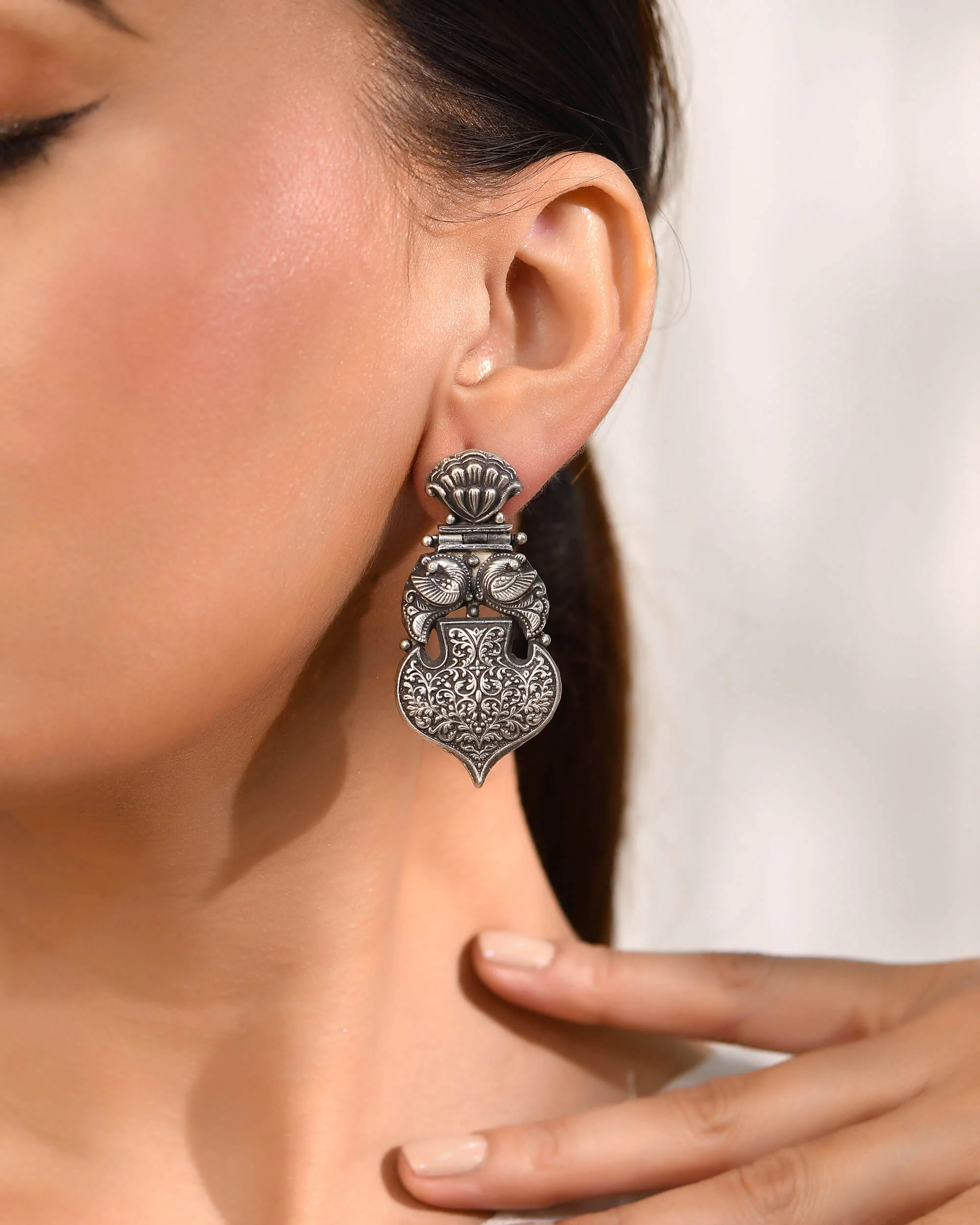 Temple silver earrings